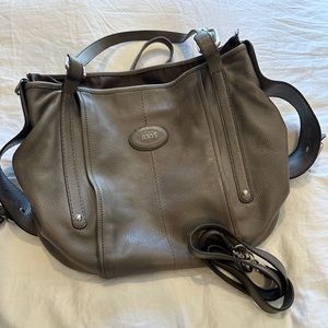 Tods Grey purse with arm and shoulder strap.
